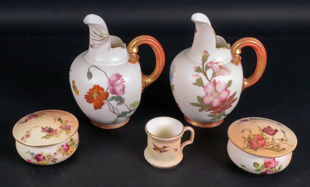 A pair of Royal Worcester flat back jugs