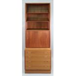 A Hundevad Danish retro teak combined bookcase, desk with fall front and four drawers below,