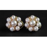 A pair of cultured pearl earclips of clu