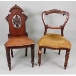 A late Victorian carved mahogany hall ch