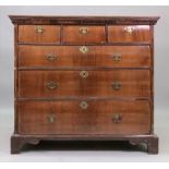 The upper part of a William & Mary walnut tallboy chest, the later top above a moulded frieze,