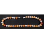 A fresh water cultured pearl, jasper, ag