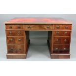 A Partners George III style mahogany kneehole desk, late 19th century, with inset top,