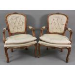 A pair of Louis XV style fauteuil, with