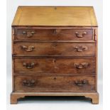 A George III mahogany bureau, the hinged