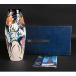 A Moorcroft vase, tube lined with flower