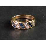 A gold sapphire and diamond set half hoo