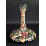 A Moorcroft vase, tube lined with flower