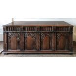 A reproduction 17th century style oak co