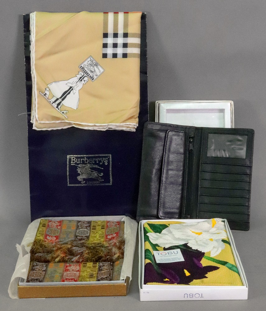 A Burberry pure silk scarf, in card sleeve, two Japanese silk scarves,