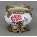 A French gilt metal mounted compressed baluster 'famille-rose' bowl, 19th century,