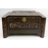 A Chinese carved camphorwood coffer, 20t