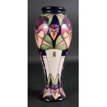 A Moorcroft vase, tube lined with flower