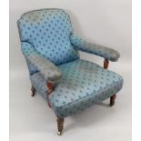 A late Victorian walnut frame armchair,