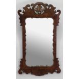 A mid 18th century style upright wall mirror,