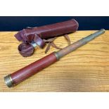 A brass three-draw telescope, late 19th/early 20th century, with wooden casing, 73cm long,