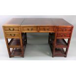 A Chinese rosewood kneehole desk, 20th c