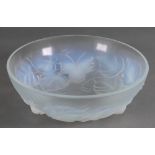 An Etling France 151 opalescent glass bowl, moulded with flowers and leaves, 20cm diameter.