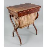 A Regency mahogany needlework table, the
