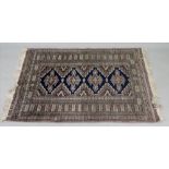 A Pakistan Bokhara rug, with four joined lozenges, 135 x 93cm,