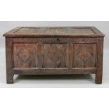 A late 17th century oak coffer, of panel