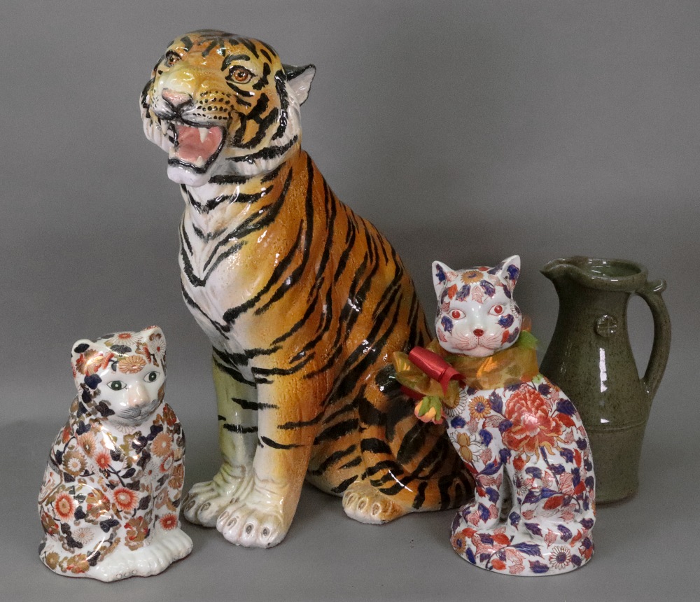 A large Italian ceramic figure of a tiger, 20th century, 60cm high, a studio pottery pitcher,