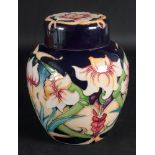 A Moorcroft vase, tube lined with flower