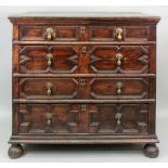A late 17th century oak chest, of panelled construction,