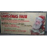 A large St James's Christmas fair wooden painted advertising board, mid 20th century, 248cm x 125cm.