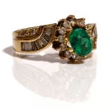 A gold, emerald and diamond ring, (the central oval cut emerald detached, but present),