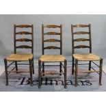 A set of five early 20th century stained beech ladderback dining chairs, 44cm wide x 99cm high,