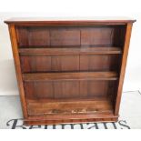 A Victorian mahogany bookcase on bun feet, 103cm wide x 105cm high.