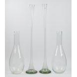 A near pair of large clear glass specimen vases of tapering form, early 20th century,