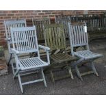 A matched set of six modern grey painted hardwood folding garden chairs to include two carvers,