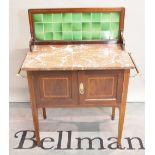 An Edwardian mahogany chequer banded washstand with tiled back and marble top,