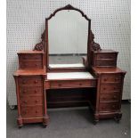 A Victorian Duchess style walnut dressing table,