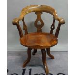 A Victorian mahogany office swivel chair, on four shaped supports, 55cm wide x 87cm high.