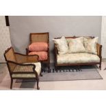 A late 19th century mahogany framed bergere sofa, 124cm wide,
