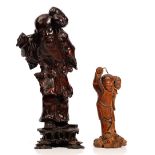 A Chinese rootwood carving of a bearded man, late 19th/20th century,