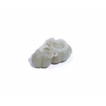 A Chinese pale celadon jade carving of lotus pods, Qing dynasty, 7cm. wide.