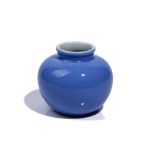 A small Chinese blue ground vase, of compressed globular form with everted rim, 9.5cm. high.