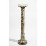 A grey onyx marble pedestal, 20th century, with ring turned cylindrical column,