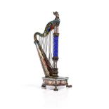 A late 19th century Viennese silver and polychrome enamelled model, designed as a harp,