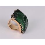 Carved jadeite dress ring of arched plaque design, the rectangular jadeite plaque carved with carp,