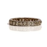 A platinum and diamond set full eternity ring, mounted with cushion shaped diamonds,