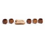 ROBERT THOMPSON 'The Mouseman' five octagonal oak napkin rings,