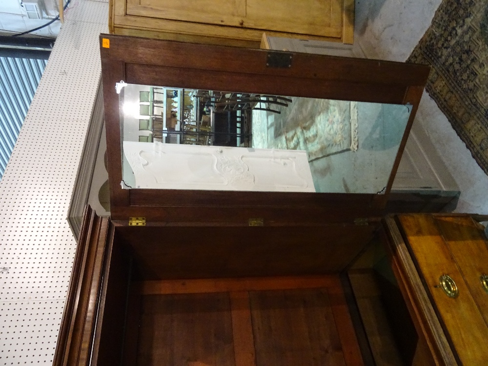 A George III mahogany linen press with moulded cupboard doors over two short and one long drawer, - Image 4 of 9