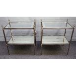 A pair of 20th century silvered metal and glass rectangular two tier occasional tables,