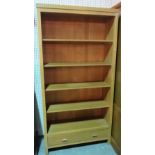 A modern oak five tier open bookcase with single drawer base,