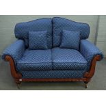 A modern Regency style two seat sofa, with pattern blue diamond upholstery, 155cm wide x 94cm high.